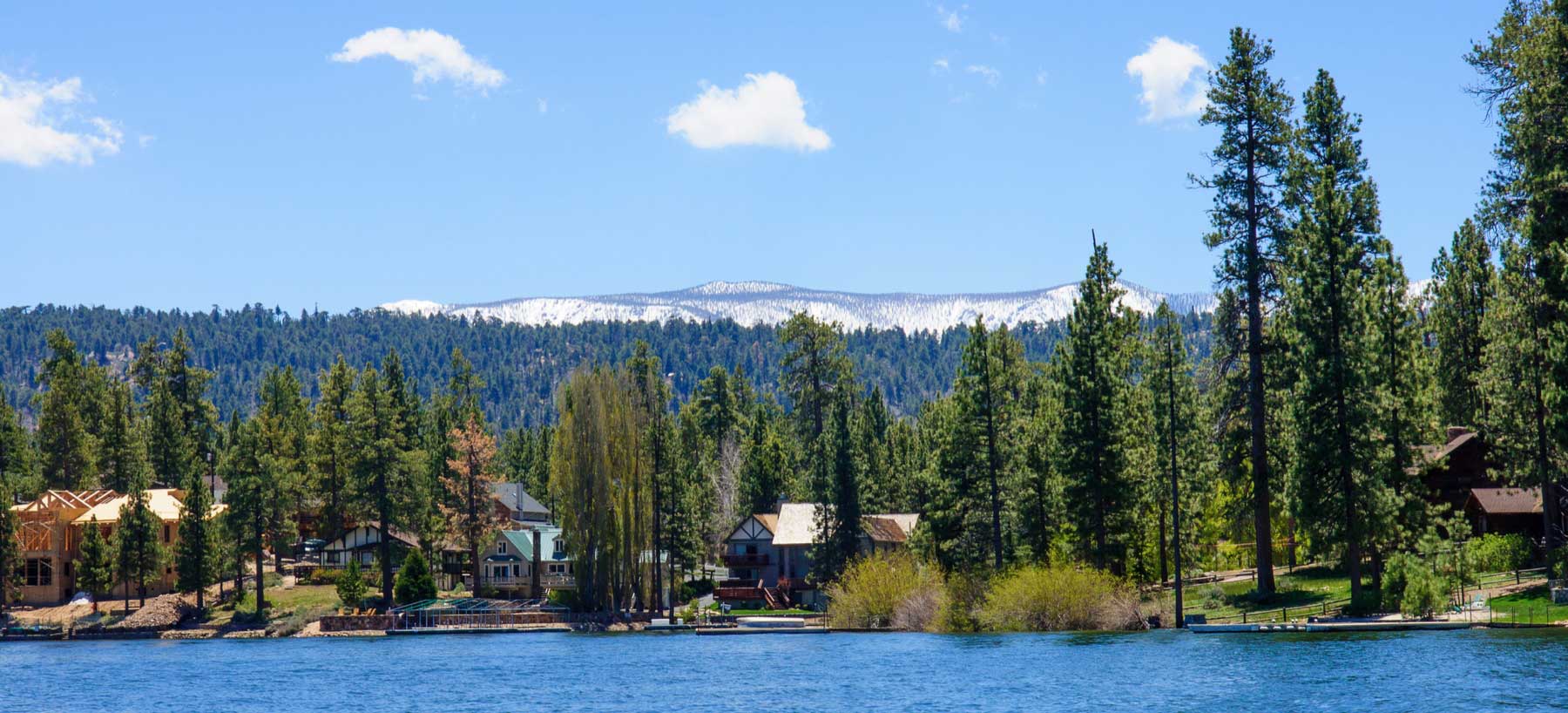 big bear lake with mountains and trees in the background