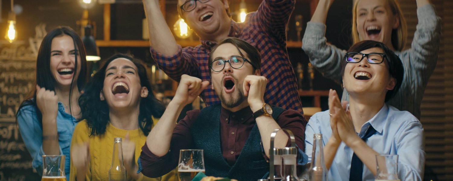 People laughing at a bar during the big bear comedy festival